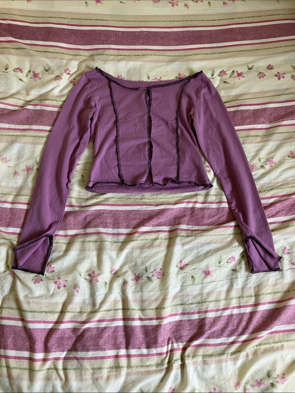 exposed seam purple long sleeve cropped top